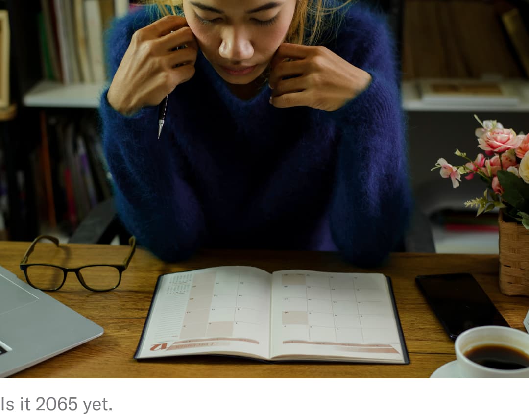 A woman looking at her calendar