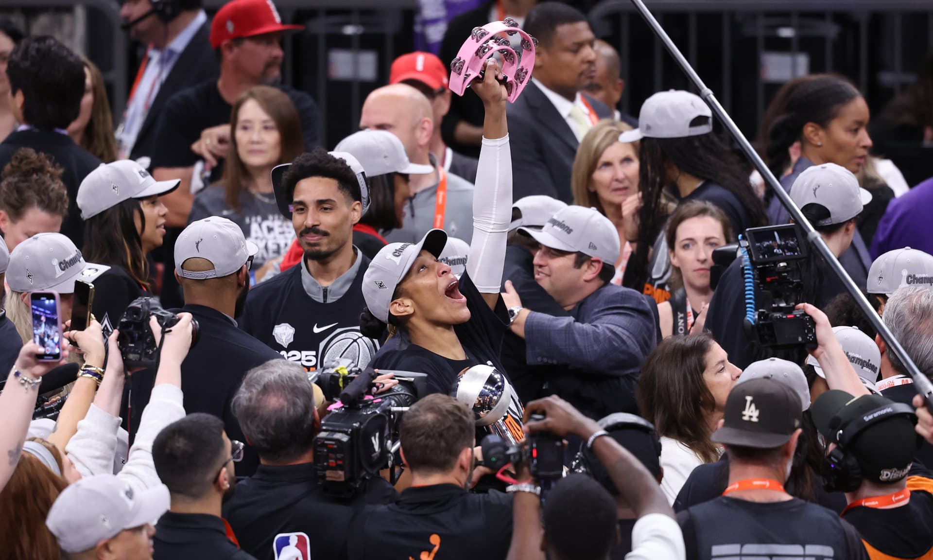 A'ja Wilson #22 of the Las Vegas Aces celebrates with the Most Valuable Player award after winning Game Four of the 2025 WNBA Playoffs finals