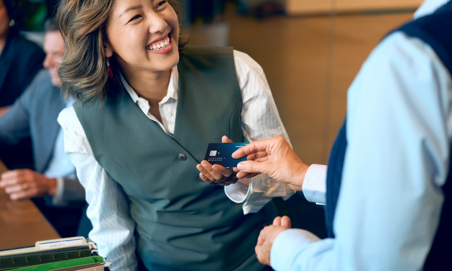 woman accepting capitol one